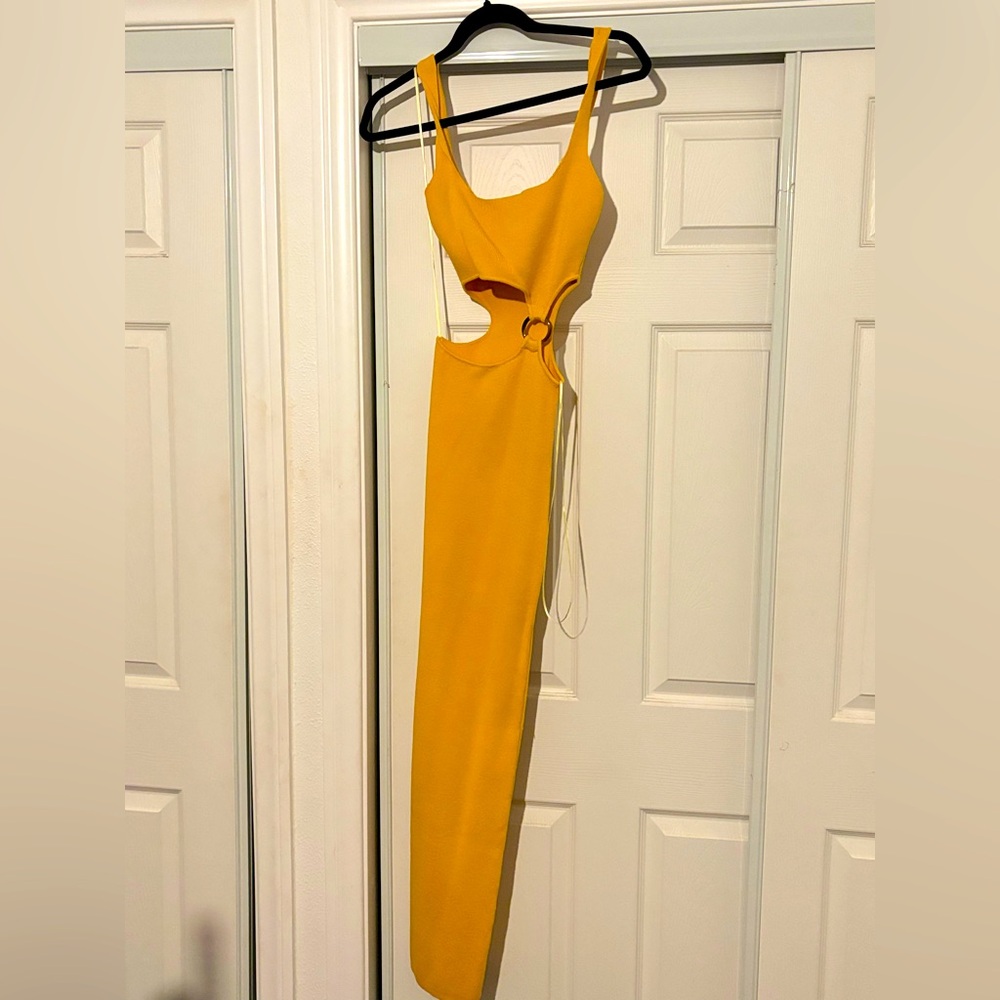 Yellow long dress. A little snagged on the back. Worn twice